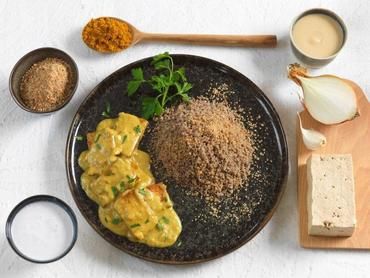 Filets de poulet au curry et à la purée d'amande